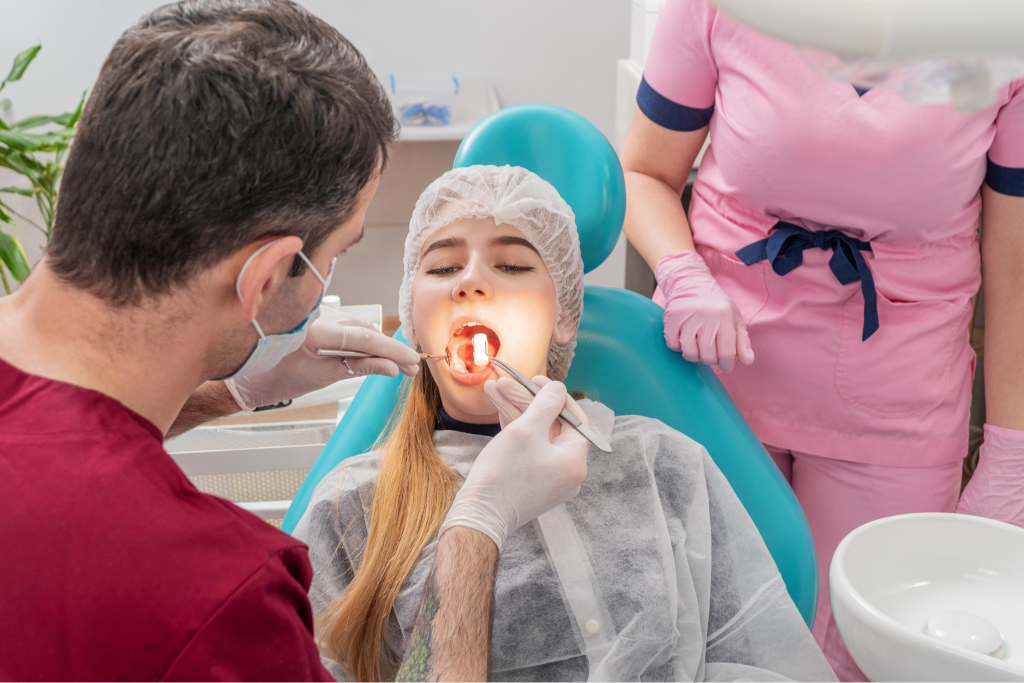 A dentist carefully examining a patient's teeth